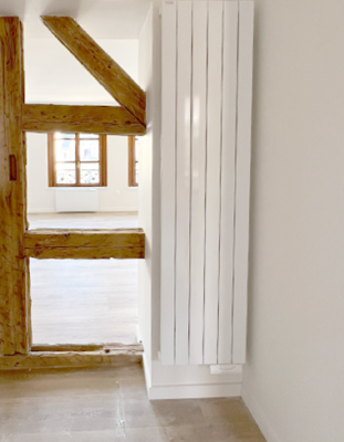 Radiateur installé dans une maison alsacienne